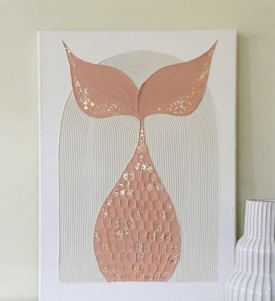 Golden Koi: a blush pink tail fin with scale texture and gold flakes, set in a pale arch, front view