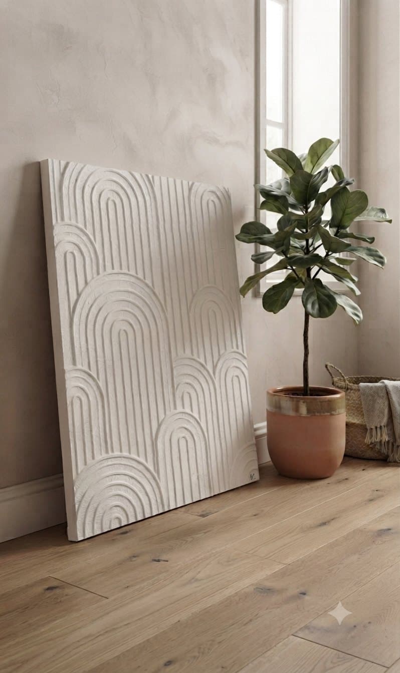 Room visualisation: Arch Texture Art leaning against a wall beside a potted plant