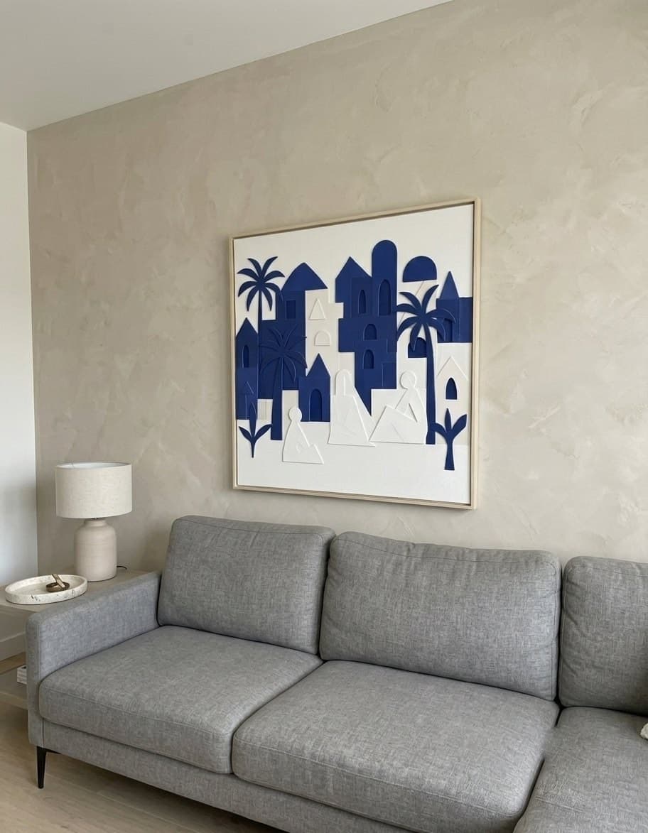 Room visualisation: The Blue Oasis hung above a grey sofa